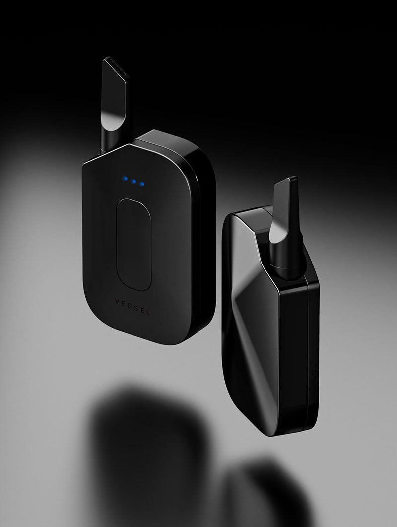 Front and back side-by-side view of the Vessel Compass Rise Obsidian, demonstrating the 3-LED indicator and the protective cartridge drop-in design.