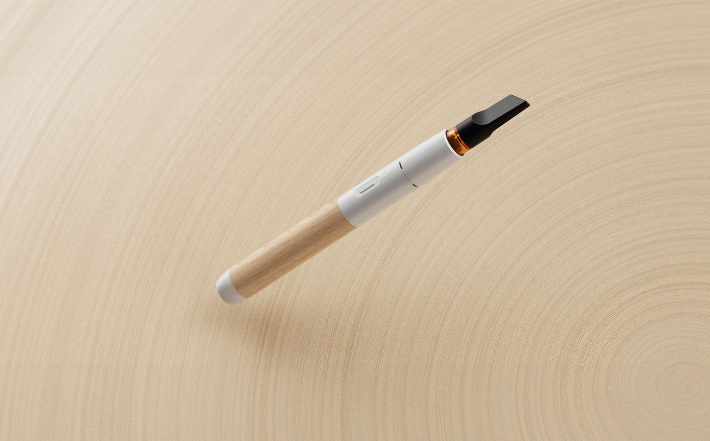 A crisp, close-up studio shot of the Vessel Craftsman 510 vape battery in White and Beechwood at a dramatic slanted angle. The image captures the striking contrast between the smooth matte white aluminum collar and the organic light-brown wood grain pattern below, with a clear glass 510 oil cartridge cleanly loaded into the protective drop-in port.