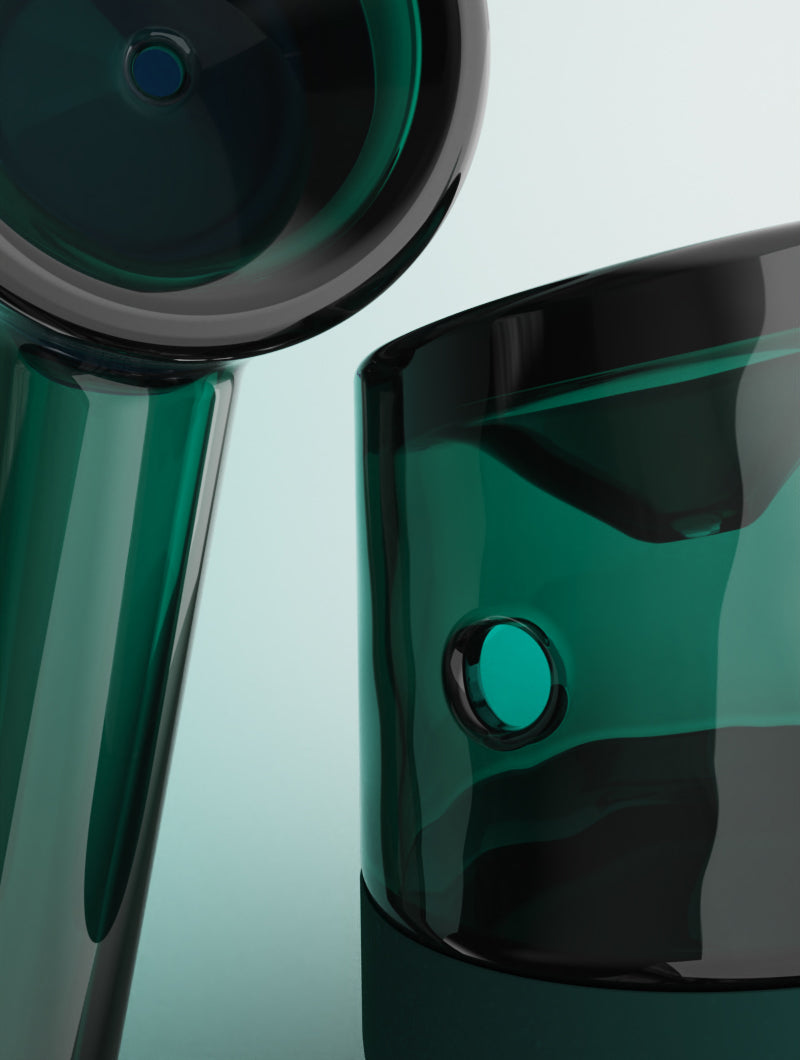 A detailed functional shot of the Emerald Vessel Forge highlighting the glass anatomy. The primary pipe showcases the large, deep-loading bowl, while the second pipe is perfectly angled to feature the precision-drilled carb hole on the side, illustrating the effortless airflow control of this borosilicate piece.