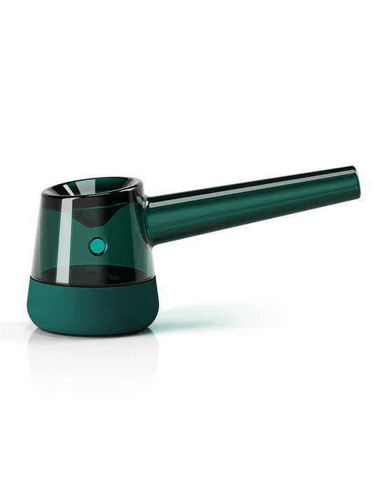 A side profile of the Vessel Forge Glass Pipe in Emerald. The shot highlights the elegant, hand-sculpted borosilicate glass body and the deep bowl, showcasing how the frosted glass transitions into the rich emerald green silicone base.