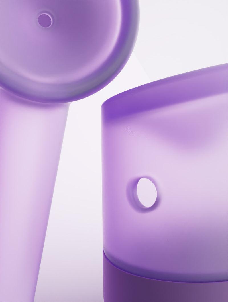 A functional duo shot of the Lilac Vessel Forge. The primary pipe highlights the deep, hand-sculpted loading bowl, while the second pipe is angled to showcase the precision-placed carb hole on the side. This view illustrates the superior airflow control and generous capacity of the borosilicate glass design.
