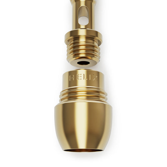A high-detail shot of the Vessel Helix Axis components. The image shows the solid brass Axis bowl alongside the signature double helix cooling spiral, highlighting the precision-engineered threads and the refined, flatter top design.