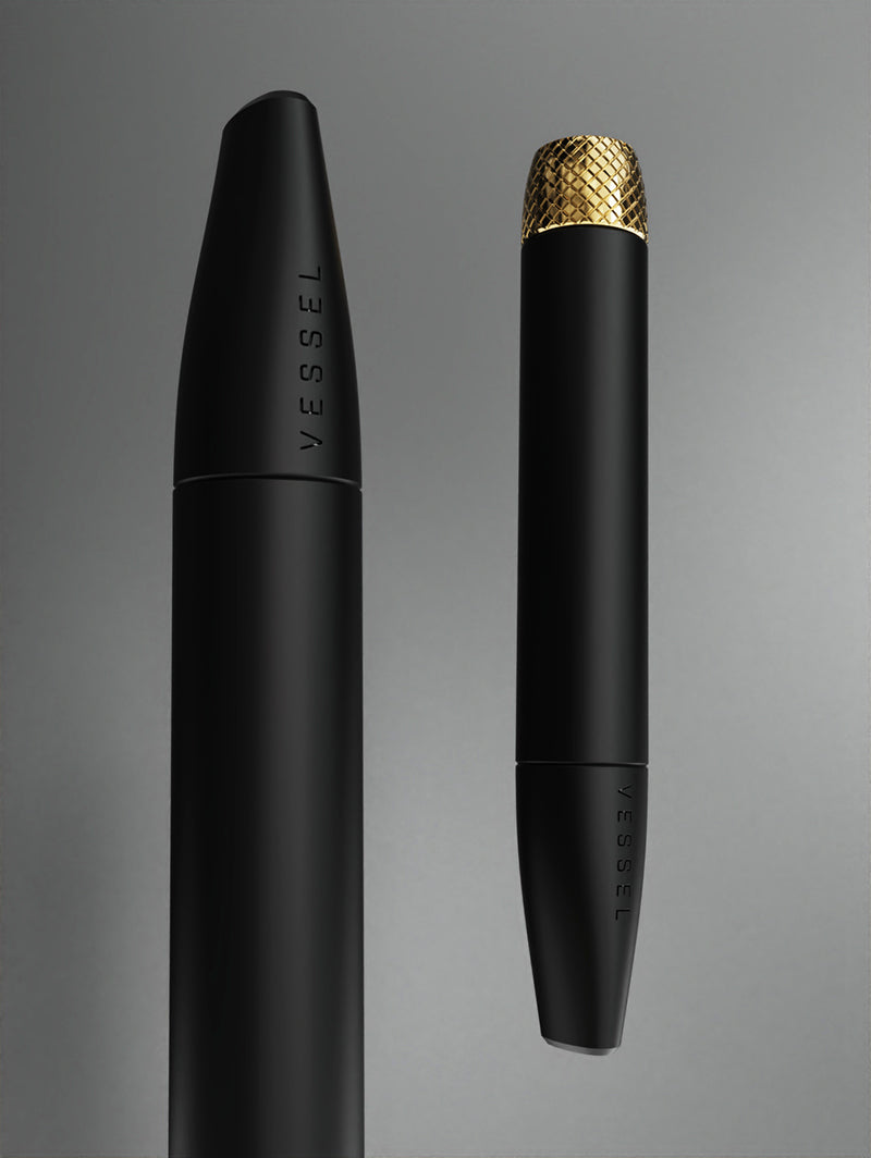 Two Vessel Helix Black pipes shown from different perspectives. This shot illustrates the smooth, tapered ergonomic design of the body and showcases how the deep black finish remains consistently matte from the bowl to the tip.