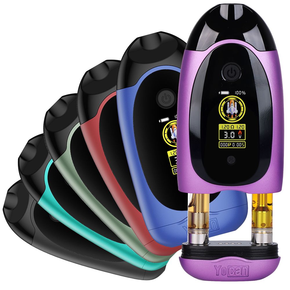 Yocan Dubb 510-threaded Dual Cartridge Vaporizer shown in multiple premium colors with two oil cartridges actively installed, featuring a large centered OLED display and ergonomic palm design.