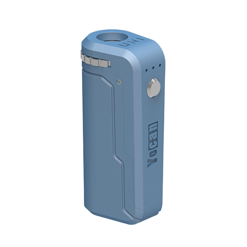 A front-angle profile of the Yocan UNI in Airy Blue. This variant is shown in a soft, sky-blue matte finish that gives the industrial design a modern, light aesthetic. The image showcases the recessed cartridge chamber and the prominent Yocan branding debossed along the side.