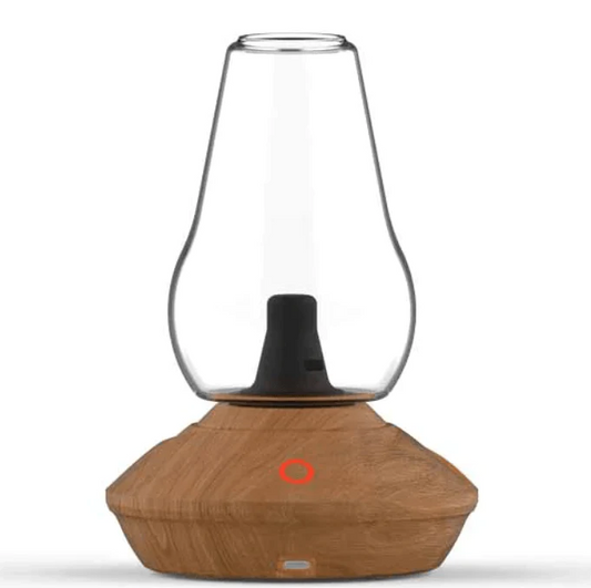 A clean front-facing studio product shot of the Zenco Duo Vaporizer featuring the premium Wood finish base. The unit stands upright with its natural, rich wood-grain styled base supporting a sleek, clear borosilicate glass vapor cup chalice mounted on top, highlighting the modern touch-activation power button on a crisp background.