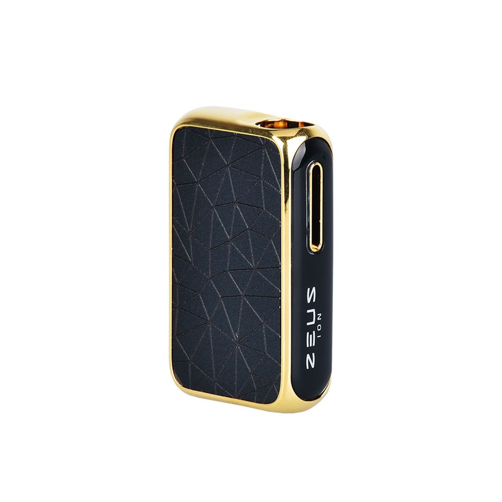 A front-angled product shot of the Zeus Ion vape battery in Matte Black and Gold with an empty cartridge chamber. The image highlights the clean, premium metallic gold Zeus logo stamped onto the faceted front face of the device, situated right beside the illuminated accent LED light strip that signals device power status.